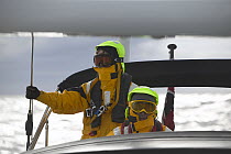 Two crew members dressed in protective clothing against the bitterly cold weather experienced in South Georgia.