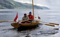 Two men rowing through Loch Ness during the Great Glen Raid, Scotland. ^^^Rowing in the narrow stretches and sailing through the lochs, the Great Glen Raid competitors cross Scotland along the Caledon...