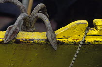 Grapnel (small anchor) on an oyster boat in La Rochelle harbour, France.