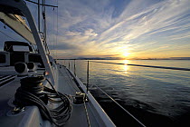 The sun reflecting off the horizon at midnight, from aboard the superyacht "Shaman", Norway, 1998.