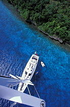 View from the mast of yacht "Shaman" off the northern Vava'u islands, Tonga, Pacific Islands.