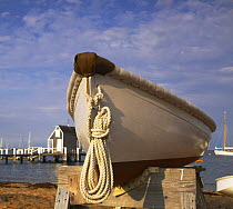 Wooden dinghy pulled out in Vineyard Haven, Martha's Vineyard, Massachusetts, USA.