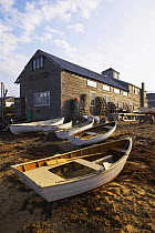 Wooden dinghys pulled out on the beach in Vineyard Haven, Martha's Vineyard, Massachusetts, USA.