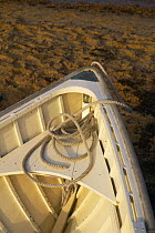 Wooden dinghy pulled out on the beach in Vineyard Haven, Martha's Vineyard, Massachusetts, USA.