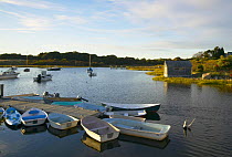 Boathouse and dock on Nashaquitsa Pond, Martha's Vineyard, Massachusetts, USA.