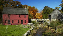 The house where artist Gilbert Stuart was born in 1755, in Saunderstown, Rhode Island. It is a fine example of a typical New England wooden clapboard house with a water wheel on the right of the house...