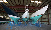 Wooden boats in the shed for winter storage in Wickford, Rhode Island, USA.