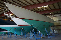 Wooden boats in the shed for winter storage in Wickford, Rhode Island, USA.