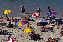 Sun bathers on Ipanema Beach, Rio de Janeiro, Brazil.
