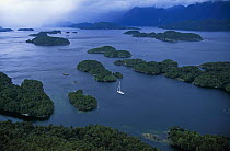 88ft sloop "Shaman" anchored among the islands of Fiordland, South Island, New Zealand. Property Released.