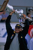 Dean Barker holding the America's Cup, he helmed the Team New Zealand boat in the 5th race which they won, 2000.