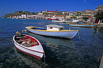 Fishing boats moored along the waterfront, Grenada, Caribbean.