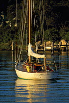 Crusing yacht "Dolphin" anchored in Cape Cod bay, Massachusetts, USA.