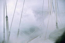 Yacht "Sariyah" crashing through rough seas near Cape Horn, Chile.