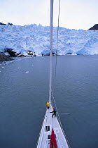 Masthead view aboard 88ft sloop yacht "Shaman" of the foot of a glacier, Alaska. Model and Property Released.