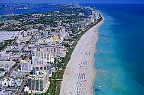 Aerial view of the long beachfront and skyscrapers at South Beach Miami, Florida, USA.