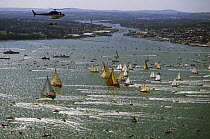 J-Class start with a helicopter flying overhead in the Round the Island Race held off Cowes during the America's Cup Jubilee 2001, Isle of Wight, UK.