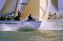 John Bertrand at the helm and Alan Bond aboard, the 12m "Australia II" racing in the America's Cup Jubilee 2001, Isle of Wight, UK.