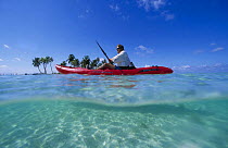 Kayaking in clear waters, Belize.