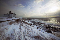 Snow drift at the Beavertail Lighthouse on Jamestown, Rhode Island, USA.