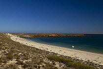 A small boat on a beach in the Dampier archipelago, north-west Australia.