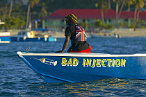 Local man on board "Bad Injection" during Grenada Sailing Festival 2005, Grenada, Caribbean.