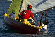Locals sailing a traditional boat during Grenada Sailing Festival 2005, Grenada, Caribbean.