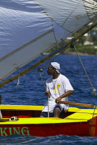 Locals racing a traditional boat during Grenada Sailing Festival 2005, Grenada, Caribbean.