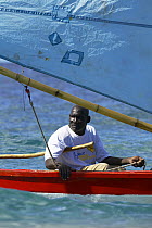 Local racing a traditional boat during Grenada Sailing Festival 2005, Grenada, Caribbean.