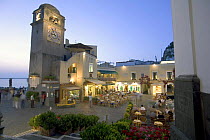 Chapel and clocktower overlook the small piazza in the village of Anacapri, Capri, Italy.