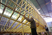 Shipwrights at work during construction of a 38-metre wooden motorboat, at a boatbuilders in Fiumicino, Rome. ^^^It is rare today to see big boats such as this made of wood.