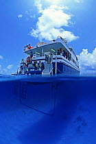 Luxury yacht "Wave Dancer", specialising in dive cruises in the Belize Cayes, Caribbean. The bar for decompression can be seen underwater at -3 meters.