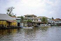 Belize river in Belize City. ^^^The word Belize comes from the Mayan "belix", which means "murky", since the water of the river carries to the sea all the mud coming from the rain forests of the inlan...