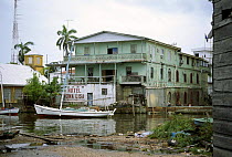 Sailing-boat moored outise Hotel Mona Lisa on the Belize river in Belize City. ^^^The word Belize comes from the Mayan "belix", which means "murky", since the water of the river carries to the sea all...
