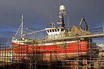 Fishing vessel in dry-dock for repairs. Summer 2005.