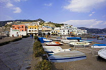 View of Ischia from the causeway linking the little island of Borgo Sant'Angelo, connected to the island of Ischia by a thin isthmus. Bay of Naples, Italy.