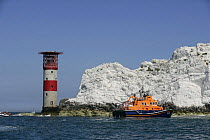 RNLI Lifeboat on standby near The Needles Lighthouse during the JPMorgan Round the Island Race, Isle of Wight, England, UK, 18th June 2005.
