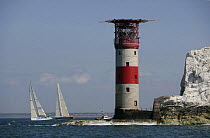Yachts racing in the JPMorgan Round the Island Race, with The Needles Lighthouse in the foreground, Isle of Wight, England, UK, 18th June 2005. ^^^"Maximus" took line honours finishing the 50 mile cou...