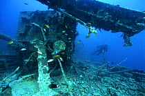 Diver exploring the stern deck area on the wreck of the SS "Thistlegorm", located in the Straits of Gubal, Northern Red Sea. ^^^She was sunk by German bomber planes in World War II and has lain at the...
