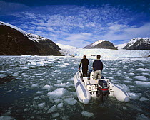 Tender of yacht "Sariyah" exploring the foot of a glacier in the southern fjords of Chile.