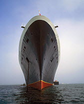 Bow view of Cunard's cruise liner the "Queen Elizabeth II" (QEII), at anchor.