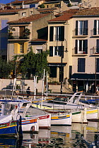 Traditional pointu fishing boats moored in the port of Cassis, France