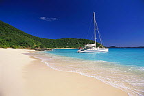 Catamaran anchored off beach in White Bay, Jost Van Dyke Island (JV Dyke), British Virgin Islands (BVI).
