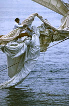 Bowmen battling with foresails aboard classic yacht "Altair".
