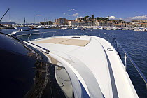 Continental 80 motor boat heading toward Cannes old harbour, France.