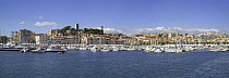 Yachts moored in Cannes old harbour, France.