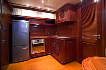Kitchen aboard an Abati Yachts' Portland 55ft, called a "lobster" boat because it is copied from the original american lobster fishing boats. Tuscany, Italy.