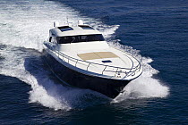 Continential 80 motor yacht, designed and built at Cantieri CNM, cruising the coast of Cannes, France.