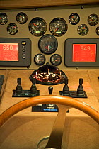 Steering wheel and control panel in a Continential 80 motor yacht, designed and built at Cantieri CNM. Cannes, France.