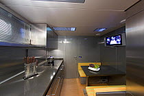 Modern fitted kitchen on a Continential 80 motor yacht, designed and built at Cantieri CNM. Cannes, France.